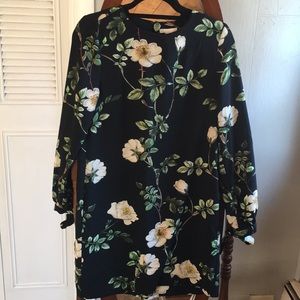 Black shift dress with white flowers